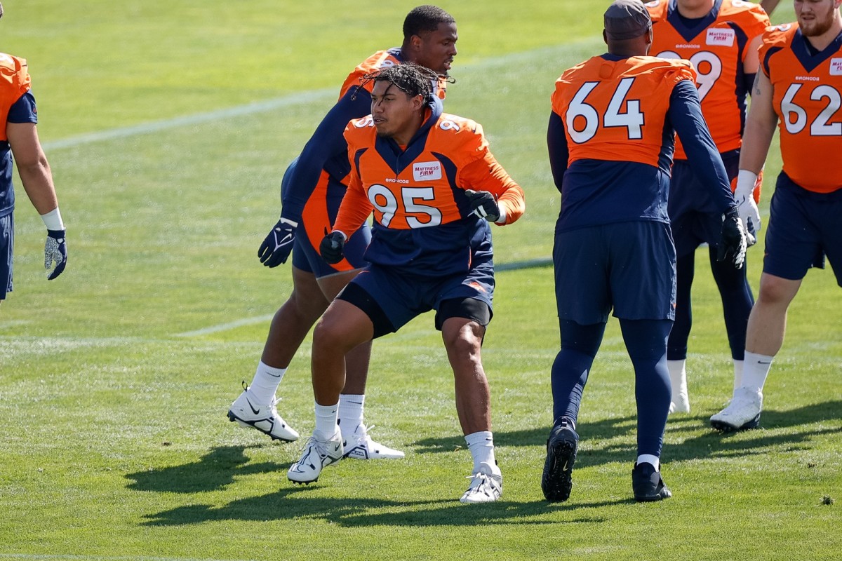 Denver Broncos defensive tackle Elijah Garcia (95) during training camp at Centura Health Training Center.